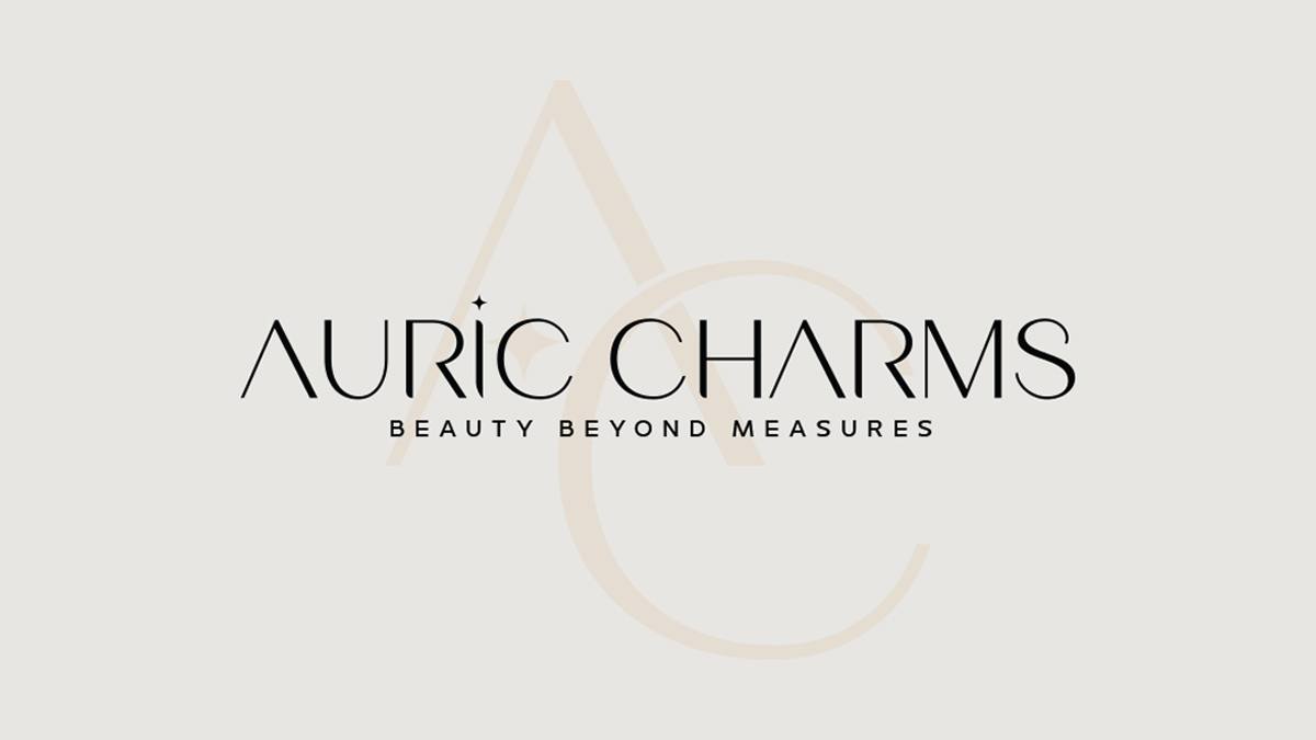 Auric Charms logo on light background